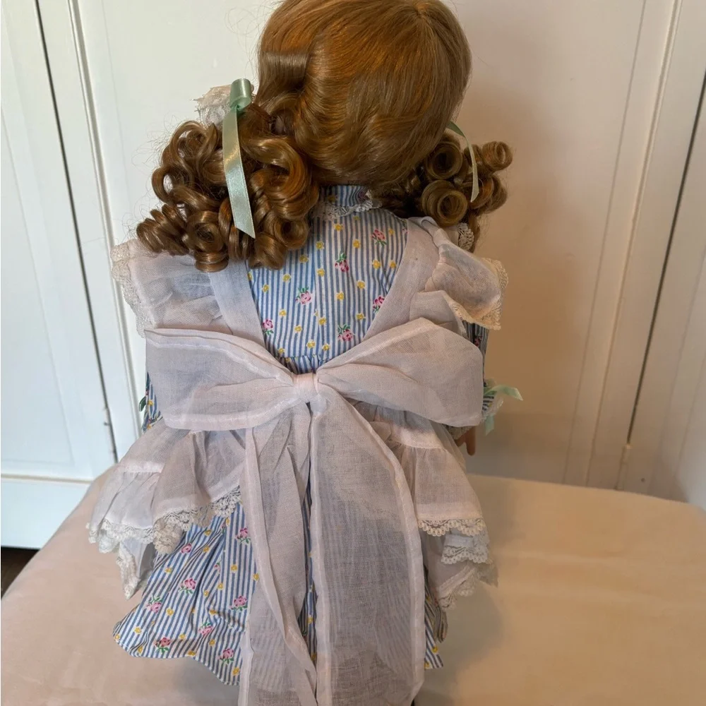 Charming Blue and White Porcelain Doll with Curly Hair - Picture 5 of 11